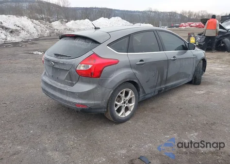 2013 Ford Focus Titanium z USA, uszkodzony, nr VIN 1FADP3N22DL135564